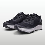 Nivia Hawks 2.0 Training Shoes on a gym floor, featuring a lightweight design and breathable mesh upper.