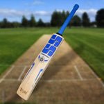 SS Custom English Willow cricket bat displayed on a cricket field, showcasing its fine grain structure and ergonomic handle.