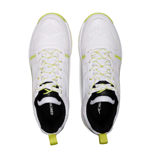 Close-up of Hundred Hyperturf cricket shoes featuring durable sole grip and sleek athletic design.