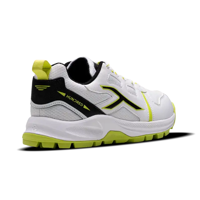 Close-up of Hundred Hyperturf cricket shoes featuring durable sole grip and sleek athletic design.