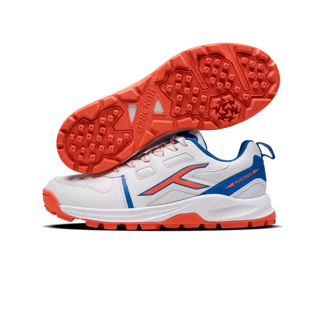 Close-up of Hundred Hyperturf cricket shoes featuring durable sole grip and sleek athletic design.