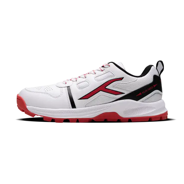Close-up of Hundred Hyperturf cricket shoes featuring durable sole grip and sleek athletic design.