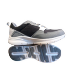 Gowin Running Shoes NX-4 placed on a fitness mat, featuring a cushioned sole and breathable mesh design.