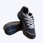 Gowin Racer running shoes on a track, highlighting their lightweight design and sporty look.