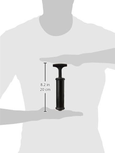 Person using a compact football hand pump with a flexible hose to quickly inflate a football on a grassy field.
