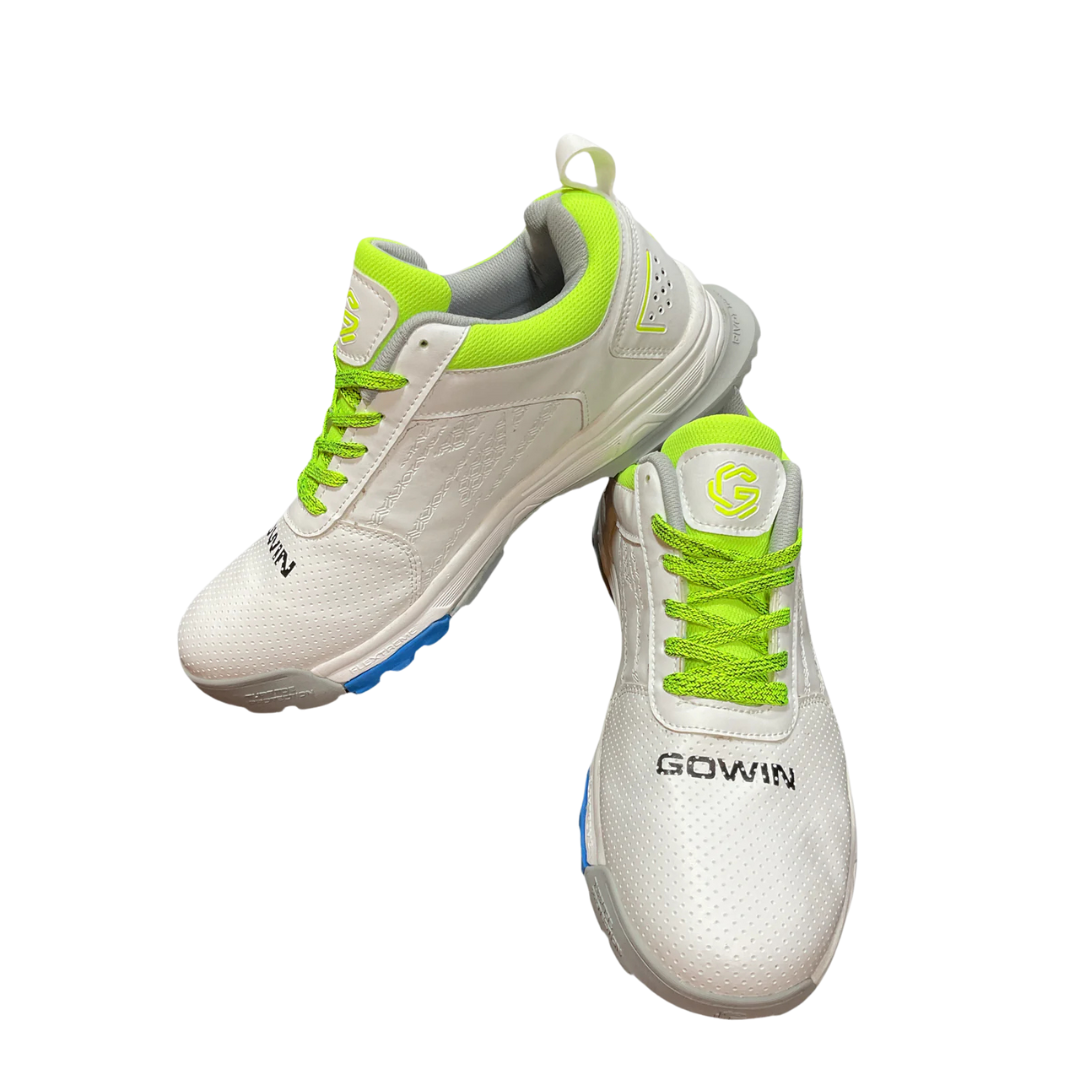Gowin Cricket Shoes Turf Pro with studded sole and breathable upper design, displayed on artificial turf ground.