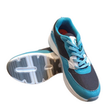 Gowin Running Shoes NX-4 placed on a fitness mat, featuring a cushioned sole and breathable mesh design.