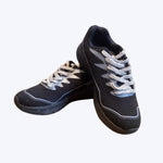 Gowin Racer running shoes on a track, highlighting their lightweight design and sporty look.