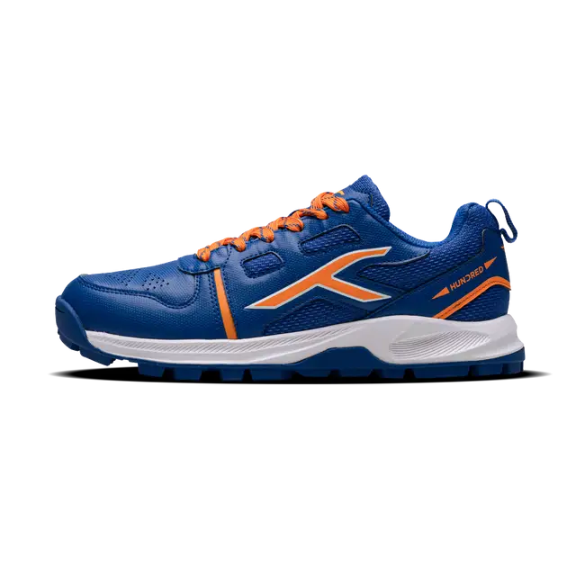 Close-up of Hundred Hyperturf cricket shoes featuring durable sole grip and sleek athletic design.