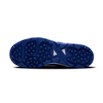 Close-up of Hundred Hyperturf cricket shoes featuring durable sole grip and sleek athletic design.