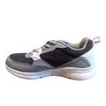 Gowin Running Shoes NX-4 placed on a fitness mat, featuring a cushioned sole and breathable mesh design.