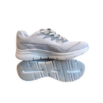 Gowin Racer running shoes on a track, highlighting their lightweight design and sporty look.