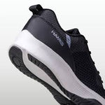 Nivia Hawks 2.0 Training Shoes on a gym floor, featuring a lightweight design and breathable mesh upper.