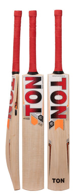 SS TON Maximus cricket bat placed on a cricket pitch, featuring bold branding, thick edges, and a powerful profile.