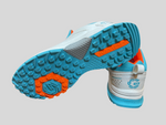 Gowin Cricket Shoes Turf Pro with studded sole and breathable upper design, displayed on artificial turf ground.