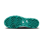 Close-up of Hundred Hyperturf cricket shoes featuring durable sole grip and sleek athletic design.