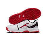Close-up of Hundred Hyperturf cricket shoes featuring durable sole grip and sleek athletic design.